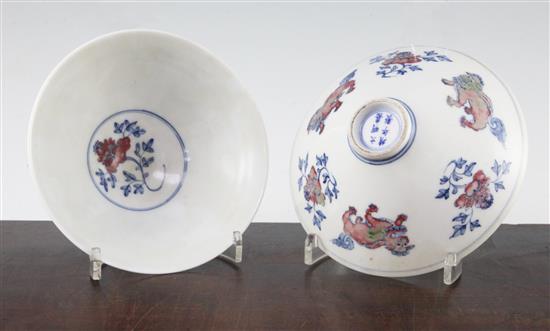 A pair of Chinese underglaze blue and copper red conical bowls, Jiajing marks, late 19th / early 20th century, 15.5cm, wood stand